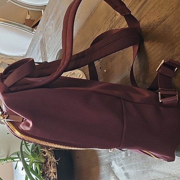 Kate Spade Purple Backpack with Structured Design and Gold Hardware - Picture 2 of 9